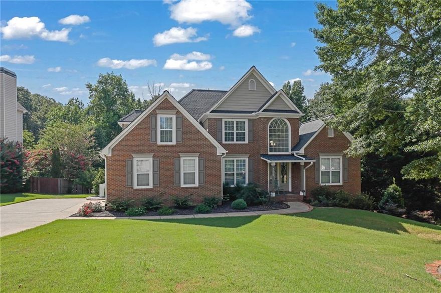 Available to Move In 12/20/2025
Nestled in the heart of Suwanee’s sought-after Ruby Forest neighborhood, this beautifully maintained 4-bedroom, 3.5-bath home offers 3,866 square feet of thoughtfully designed living space. Community amenities include a clubhouse, pool, tennis courts, pickleball, playground, lake, and direct access to George Pierce Park. You're just minutes to Suwanee Town Center, top-rated North Gwinnett schools, shopping, dining, and easy I-85 access. Enjoy a bright, open concept layout with fresh paint and new hardwood floors and new carpet in the bedrooms. The kitchen features white cabinetry, quartz countertops, stainless steel appliances, breakfast bar, and under-cabinet lighting. The primary suite is located on the main level, complete with tray ceilings, a spa-like bath, and spacious walk-in closet. Hardwood floors span the main level, while newer carpet enhances the upstairs, which includes three additional bedrooms — each with generous closets. The finished basement adds versatile living options including a full bath, office, recreation area, and additional flex room — plus an oversized workshop/storage space. Step outside to a private backyard oasis, with extensive decking that overlooks a serene creek, walking to the tennis court and walking trail.