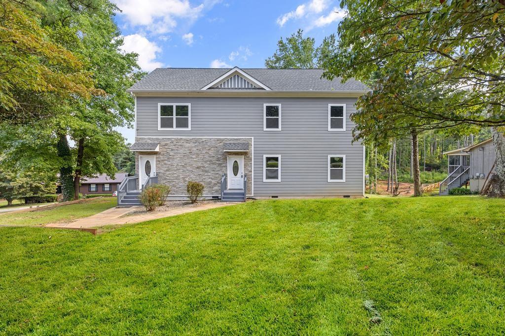 Welcome to 841 N Price Rd a beautifully built 2021 home that offers space, flexibility, and endless possibilities! Featuring 6 bedrooms, 4 bathrooms, and over 2500 sq ft of living space, this property is designed to fit a variety of needs. With two full kitchens and private entrances, it’s perfect for rental income potential, or simply room to spread out. The open concept design creates a seamless flow throughout, with bedrooms and spacious living areas that provide comfort and functionality. Whether you’re looking for a home that allows privacy for extended family, a layout ideal for entertaining, or an investment opportunity, this home checks all the boxes. Situated in a convenient location near shopping, dining, and major highways, this property combines modern living with everyday practicality. Don’t miss your chance to own this versatile and inviting home, schedule your showing today!