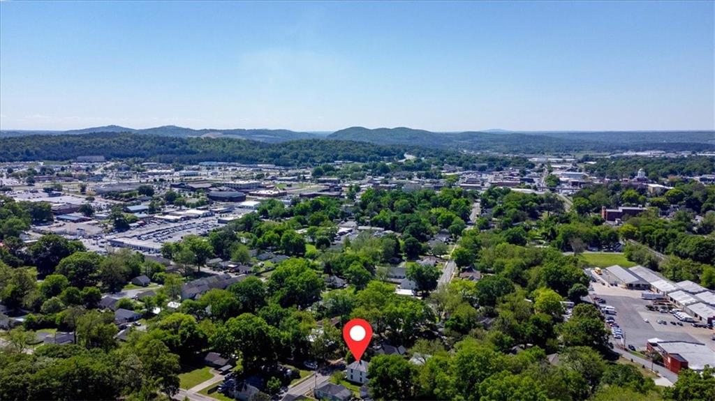 Discover an exciting opportunity in downtown Cartersville with this charming two-story property! Whether you're looking to rejuvenate this home or embark on a new project on its expansive double lot, both paths promise great potential. The home is large enough to be a 4 bed / 3 full bath. The home will require extensive repairs, is being sold as is, and will need to bought with cash.