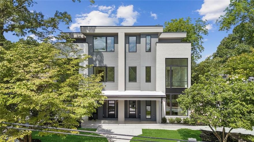 Stunningly beautiful modern Home designed by award winning Goodman Designs and bracketed between the dynamic Memorial Drive corridor and the ever popular BELTLINE. Spacious rooms feature hip designer finishes starting with the beautiful HUGE open kitchen. Extensive cabinetry, high quality stainless steel appliances and gorgeous countertops convey an elegant culinary workspace adjoining the large family room, complete with warm finishes, handsome fireplace and abundant natural light. Second floor bedroom level showcases the primary suite. Artfully executed with the SPA-QUALITY bathroom, huge walk-in closet, hardwood floors and slightly elevated vistas from the abundance of windows. 2 large secondary bedrooms anchor the generous hallway and share a lovely tiled bathroom adjacent to the large laundry room. The upper level has a large separate living room with a wet bar, rooftop terrace with covered out door lving and dining areas is the perfect tree-top escape, entertainment venue and separate 4th bedroom and bathroom. Amazing opportunity in a premium location to walk to all the shops, restaurants and shopping near the Beltline. Come see why this is the best design, finish & city views in Reynoldstown ever! Inquire about a Modern Home Mortgage 1 year rate starting at 4.75%