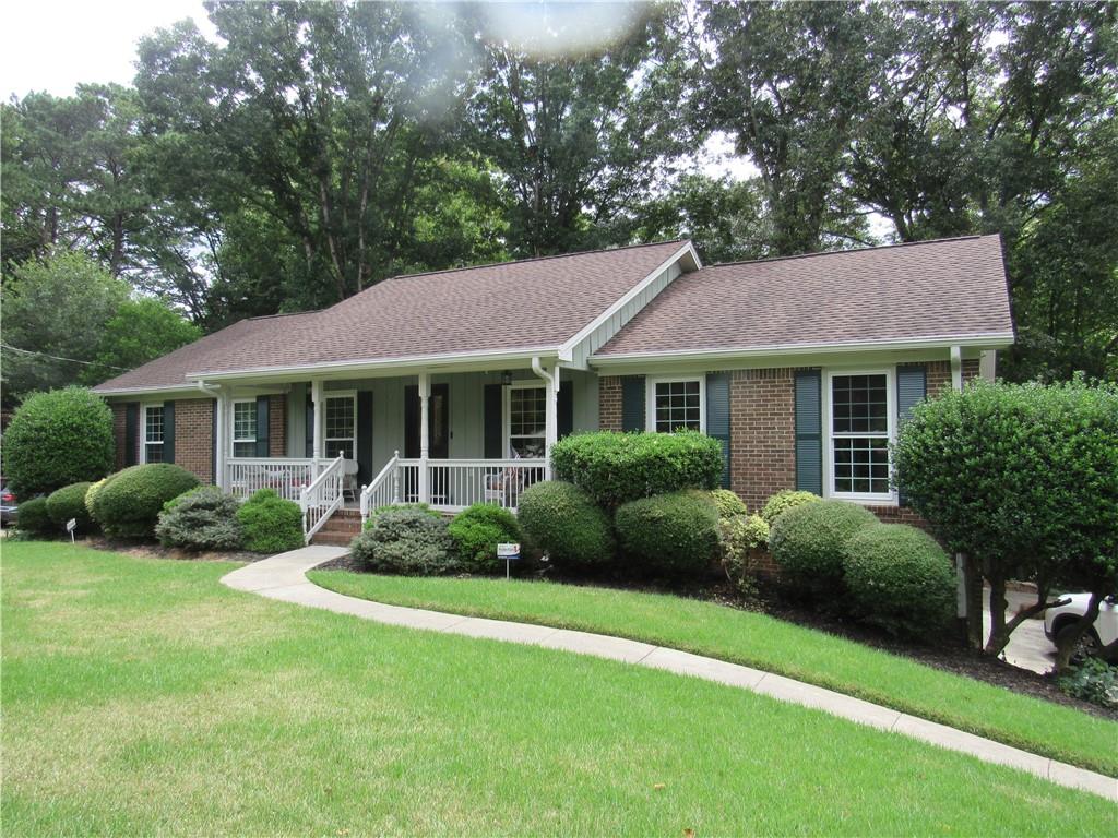 THE HOME YOU NEED with a FLEXIBLE SETUP FOR AN ACTIVE FAMILY. 4 B/R, 3 1/2 bath, 4 sides brick, custom-built, traditional ranch home in East Cobb. Open floorplan, updated & extremely well-maintained. All major systems, windows, water heater, HVAC breaker box, & roof, recently replaced or updated. Fresh paint, hardwood floors, granite counters, a clean, worry free home. Main floor has 4 b/r's, Primary suite (master), with full bath. 2 front facing b/r's share a jack n' jill bath, b/r #4 is rear-facing, next to the guest bath. All b/r's & family room have ceiling fans. Daylight, finished, terrace level, with 1/2 bath, works well for homeschool, private office, parent or teen suite. So many options to make this your dream home. EASILY CONVERT ROOMS FOR YOUR SPECIFIC NEEDS. Walk out to the secluded patio with fire pit and a huge, fully fenced backyard ready for your kids & pets. Mature landscaping on this manicured lot and a move-in ready home. Oversized garage with extra storage & automatic openers. Highly rated Cobb schools, Brumby, East Cobb Middle, Wheeler HS. Grovemeade s/d, quiet, tree-lined & family-oriented, with an active, swim/tennis & optional HOA. Easy access to Powers Ferry, Lower Roswell & Terrell Mill roads, only minutes to 75, 285, 575 & 41. Ideal location, close to parks, schools, & stores. This is the total package, with a bow on it!