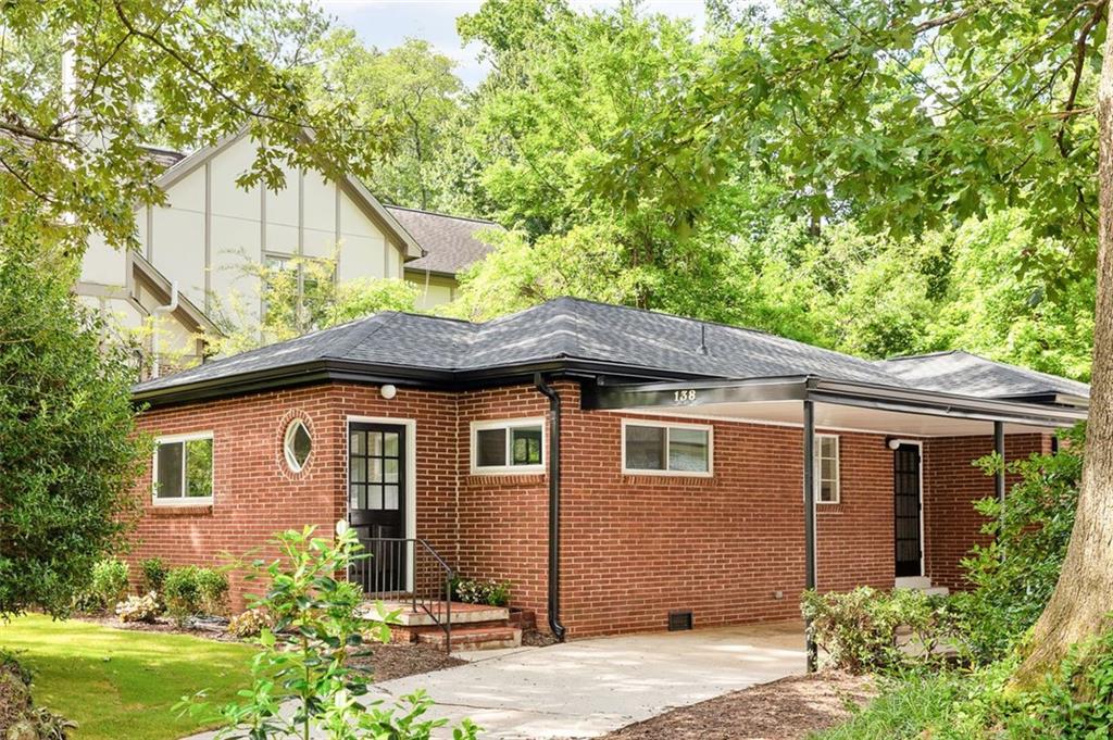 Charming brick ranch on one of the most beautiful tree-lined streets in Decatur! This beautifully updated 3-bedroom home offers a bright, functional layout with refinished hardwood floors throughout. Freshly painted from top to bottom, the home includes a beautiful kitchen with updated countertops, cabinetry, and modern lighting. Enjoy the spacious private backyard—perfect for entertaining, with plenty of room for the kids. Walkable to local favorites like Dancing Goats Coffee, the award-winning Chai Pani, the beloved “toy park,” and the neighborhood gem, Venetian Pool, this home offers the ideal blend of comfort, convenience, and community. Don’t miss this rare find in the heart of Decatur with award-winning schools.