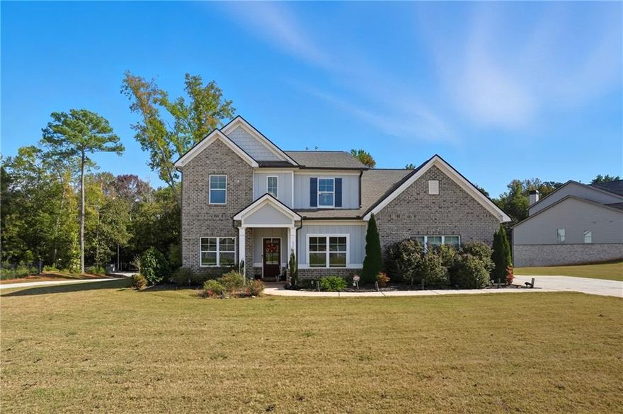 Experience modern elegance and family comfort in this stunning 1.5-story home offering nearly 4,000 sq. ft. of refined living space on almost a half-acre lot. Built within the last five years, this home showcases soaring ceilings, open-concept living, and a designer kitchen perfect for entertaining or family gatherings. The private upstairs owner's suite offers a spa-inspired bath and walk-in closet. With 3 bedrooms, 3.5 baths, and light-filled living spaces throughout, every detail reflects sophistication and warmth. Outdoors, enjoy space for play, entertaining, or future pool plans. This home isn't just a place to live it's a lifestyle for your family.