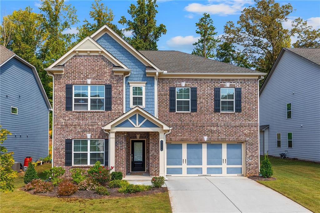 Welcome to this turnkey home, built in 2022 and cared for like new! Situated on a ¼ acre lot, this property blends comfort, convenience, and community living. Inside, you’ll find a spacious kitchen with a gas range top, built-in microwave, built-in oven, large pantry, and oversized refrigerator—perfect for any home chef. The master suite boasts a luxurious bath with a large walk-in shower and separate soaking tub, creating your own private retreat. With a 2-car garage and thoughtful design throughout, the home is move-in ready. Step outside and enjoy the vibrant neighborhood amenities, including a tennis court, basketball court, pool, and community hall. This is more than just a house—it’s a lifestyle in one of Cumming’s most desirable communities.