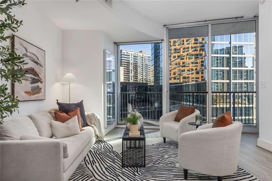 Experience vibrant city living from this stunning 10th-floor residence at 1010 Midtown, one of Atlanta’s premier luxury high-rises. Flooded with natural light, this spacious 1-bedroom, 1-bath condo offers one of the best floor plans in the building with floor-to-ceiling windows and unobstructed sweeping skyline views and an open-concept layout designed for both style and comfort.
The sleek kitchen features granite countertops, stainless steel appliances, and a large island perfect for entertaining. The living area flows seamlessly onto a private balcony—ideal for morning coffee or sunset cocktails overlooking Peachtree Street. The primary suite boasts generous closet space and a spa-inspired bathroom with a soaking tub and shower combo. Unit encompasses updated flooring, fresh paint, newer carpet from 2019, new water heater from 2022 and newer washer/dryer from 2018.
Residents enjoy access to world-class amenities, including a resort-style pool and sundeck, fitness center, clubroom, 24-hour concierge, and secure parking. Just minutes to Piedmont Park, Colony Square, the BeltLine, MARTA, I-75, I-85, GA 400, & Airport of Atlanta’s best dining, shopping, and nightlife, this is Midtown living at its most convenient and connected.