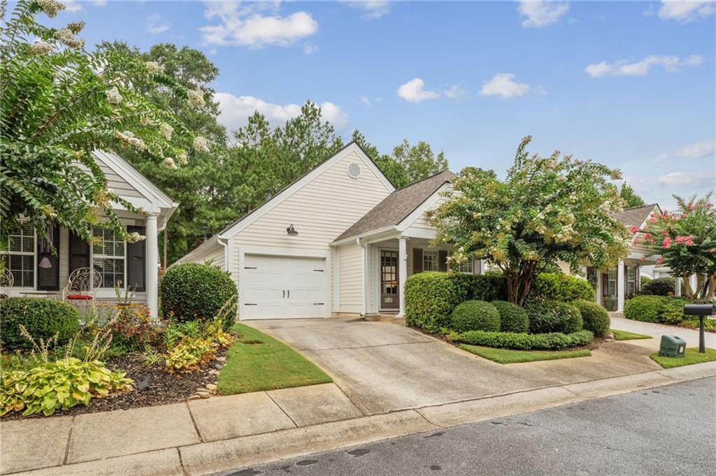 Charming cottage style home in the heart of Marietta. This meticulous maintained home has 3 bedrooms and 2 bathrooms and is in a gated community. The rocking front porch opens to a bright and sunny great room with tons of natural light. The great room has gleaming hardwood floors, vaulted ceiling and a gas fireplace. The kitchen has newer stainless appliances, gas range, sky light and a breakfast bar. The laundry closet comes equipped with a washer and a dryer. Separate eating area is open to the kitchen. Sliding glass doors open to a totally private, fenced side yard with a slate floor and a garden area. The nice-sized primary bedroom has a vaulted ceiling, walk in closet and sliding doors that also open to the private side porch. The primary bathroom has a walk in glass enclosed shower. There are two other nice sized bedrooms that have access to a full bathroom. The home also has a newer roof installed in 2020. Conveniently located near downtown Marietta, 575, 75, Barrett Parkway and medical facilities.
Water, front yard maintenance, and exterior maintenance included in monthly HOA fee.