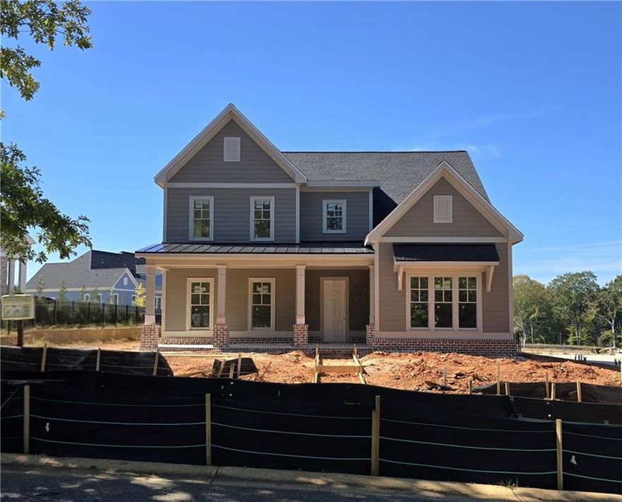 Step into the Burton—one of our most popular and expertly crafted floorplans, offering the perfect balance of space, style, and convenience. This home features a bright and open layout with covered porches in the front and back, ideal for enjoying the outdoors year-round. The main-level primary suite is a true retreat, complete with a spacious walk-in closet, dual vanities, and an oversized tiled shower. For added convenience, the laundry room connects directly to the primary bathroom. A main-floor guest suite provides comfort and privacy for visitors or extended family. The home’s centerpiece is a well-appointed chef’s kitchen, thoughtfully designed with GE Café stainless steel appliances, elegant Merillat “Bluff” cabinetry with soft-close pot and pan drawers, a deep farmhouse sink, stunning quartz countertops, a spacious walk-in pantry, and designer pendant lighting—perfect for everyday living or entertaining with ease.
Enjoy the warmth of the fireside Family Room, where built-in cabinetry and bookcases provide both charm and functionality, creating an ideal space to relax, read, or host friends. Upstairs offers wonderful flexibility with two spacious bedrooms, two full baths, and a versatile loft space perfect for a game room, home office, or lounge space. A 2.5-car garage and mudroom entry provide everyday functionality and extra storage. Plus, the HOA-maintained lawn ($544.00 quarterly fee) means low-maintenance living and more time to enjoy your beautiful home. Don’t wait—there’s still time to choose your finishes and make this home truly yours!