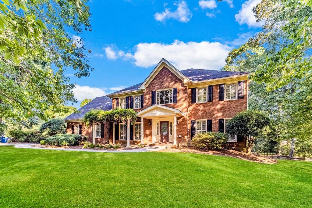 Welcome Home to this private oasis located in the coveted Brookwood High School District. Who needs a vacation when you live here? 1.45 Acres with a large saltwater pool, pool house, and a freshly refinished tennis court. You will love the outdoor fireplace, open deck, covered deck, and screen porch. Four-sided brick exterior. The inside has been freshened up and is ready to move in. The interior has been repainted in a light neutral tone from top to bottom, the hardwood floors have been refinished and there is new carpet throughout. The interior is massive and would be the perfect entertaining home with an updated and oversized chef's kitchen with double ovens, a separate prep sink in the large center island, a subzero built-in refrigerator, 6 burner gas range, icemaker, dishwasher, microwave, tons of countertop space and lots of cabinets. The breakfast-keeping area is huge and can be used in many different ways and has a lot of natural light. The family room has a tall, vaulted ceiling, a fireplace, and a wet bar. The main level laundry room with cabinetry. The formal living and dining rooms feature hardwood flooring, detailed crown, chair rails and baseboards. A full guest suite on the main level. Upstairs are 4 large bedrooms and 3 full baths. The primary bedroom has a tray ceiling and huge custom closet. The primary bathroom has a large steam shower, a Jacuzzi tub, solid cherry vanities and gorgeous stone countertops. The basement has several finished rooms, a full bath and a bar. You can access the screen porch from the basement. This home has custom features all throughout. You will not want to miss this one. Scenic Highway is minutes away with every type of shopping and restaurants that you would ever want, but you would never know it in this quiet little piece of paradise.