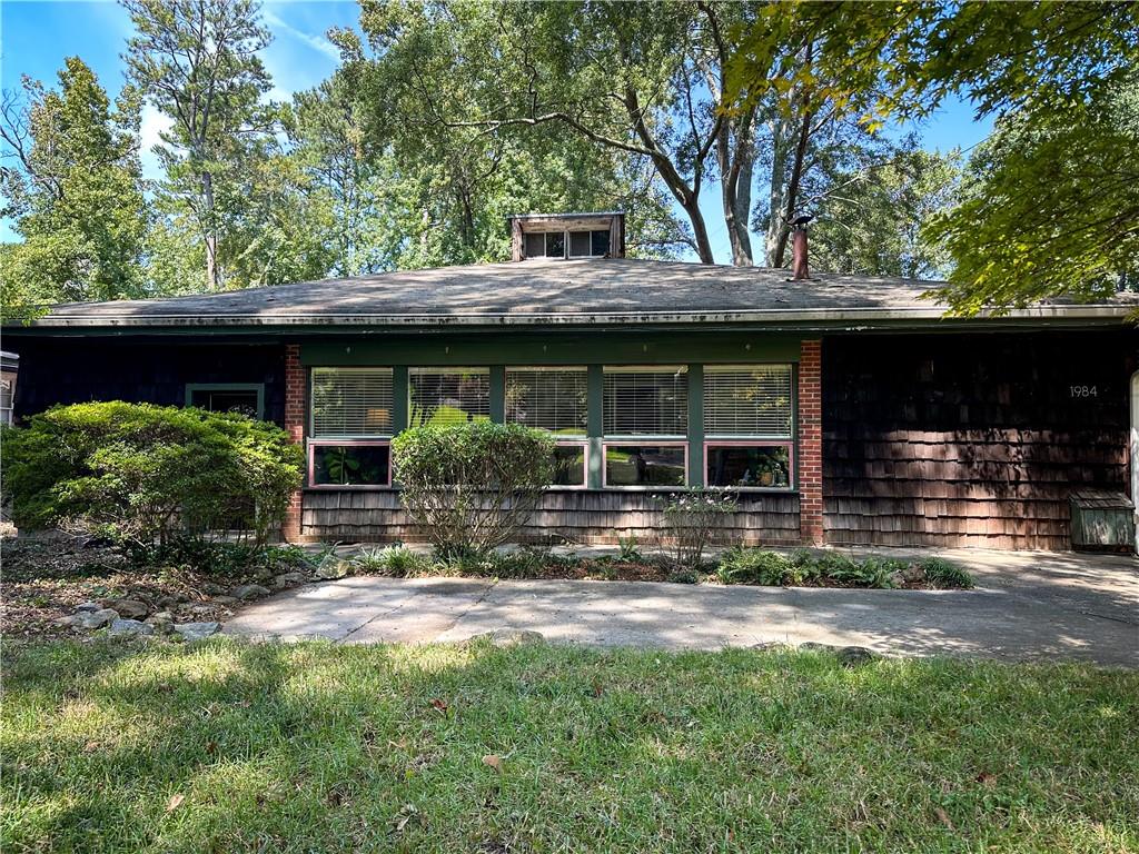 Great Value in Sagamore Hills.
This home offers a great opportunity to move into a highly desirable neighborhood with tree-lined streets, friendly neighbors, and where you can walk to school, at an affordable price. This home is ready to be revitalized so you can enjoy this home as much as the current owners have for the last 30 years. Lots of space to expand and you can slowly update over time, or come in and let your imagination go wild with this blank canvas. The current home has been artistically and creatively inspired over the years and has a bohemian rustic vibe that has been the center of many gatherings for the family and the neighborhood. Large expansive deck, fenced yard, screened porch, walk up attic already stubbed for a 4th bedroom and 3rd bath. Lots of different living spaces that can be used for home office, studio, or playroom. This could also be a great AirBnB. There are a few other Short Term Rentals (STR) in the neighborhood that do really well and this house with all it's space has a lot of potential as an STR. Such a convenient location for Emory, CDC, VA, Children's Healthcare of Atlanta, in addition to easy access to interstate and all Atlanta has to offer. 2 Swim/Tennis facilities in the neighborhood and close to Oak Grove Village and all the new development at Briarcliff and Clairmont.