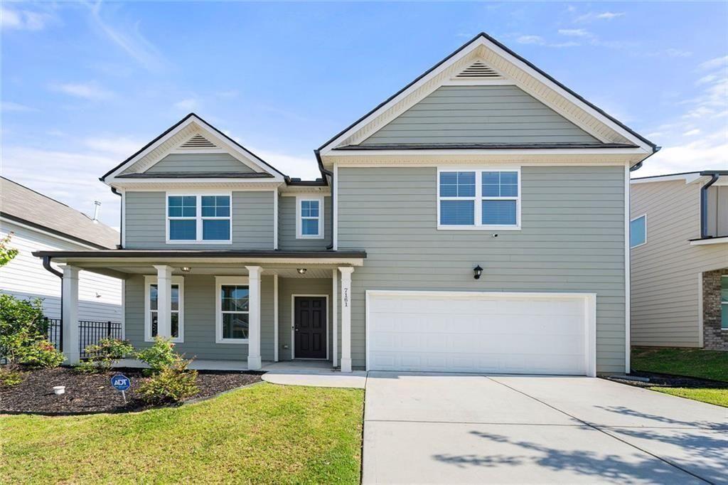 Welcome to this stunning home that blends elegance, functionality, and comfort in every corner. From the moment you arrive, you're greeted by manicured landscaping and a charming façade that sets the tone for the beauty within. Inside, soaring ceilings, rich hardwood floors, and natural light create an inviting and sophisticated atmosphere. The open-concept layout connects the living spaces seamlessly— perfect for both cozy nights in and lively gatherings. The gourmet kitchen is a chef’s dream with high-end appliances, ample counter space, and a bright dining area that encourages connection and conversation. The spacious living room, complete with a cozy fireplace, opens to a serene backyard—ideal for entertaining or relaxing under the trees. Upstairs, the luxurious master suite offers a spa-like retreat with a soaking tub, separate shower, and dual vanities. Additional bedrooms provide comfort and versatility for family, guests, or a home office. With thoughtful touches throughout—like a dedicated laundry room and generous storage—this home is designed for everyday ease and long-term enjoyment. Don’t miss your chance to experience this exceptional property. Schedule your private tour today and discover the lifestyle waiting for you.