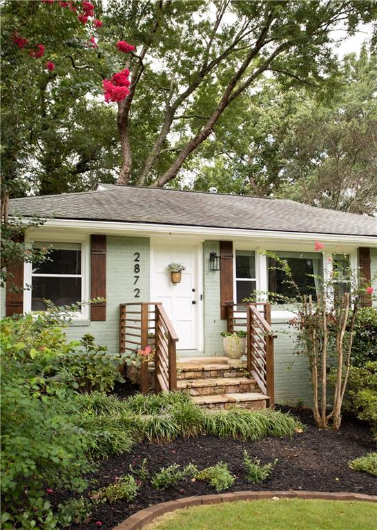 Just a short stroll down Banks Street to Smyrna Market Village, this charming brick ranch offers the perfect blend of lifestyle and location. Enjoy breweries, restaurants, coffee shops, and weekly community events—it’s like city living in the suburbs! Inside, abundant natural light highlights original hardwood floors, an updated kitchen with stainless appliances and breakfast bar, and a rare ensuite primary bedroom. A versatile lower-level bedroom works perfectly as a media, game, or playroom, while recent upgrades include custom closets, custom blinds, a stylish new laundry room with custom cabinetry, and a brand-new PVC sewer line for peace of mind. Outside, the entertainer’s backyard is made for gatherings with a spacious deck, fire pit, and plenty of room to relax and play—all just minutes from The Battery with easy interstate access.