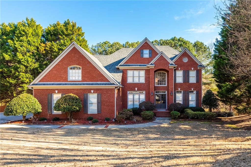 This exquisite modern home has many upgrades with hardwood flooring on all 4 levels. Nestled in the cul-de-sac of the much sought-after neighborhood of Cambridge subdivision of Alpharetta/Johns Creek with excellent schools. It is one of the larger lots with a private fence and leveled backyard. Home has lots of natural daylight throughout; traditional floorplan featuring spacious formal living room and dining; and gorgeous white kitchen with an open view to the great family room and breakfast area. There is so much space for everyone in the family or extended family such as the guest bedroom on the main level with a full bath. There is also an additional suite on the 3rd floor with its own full bath, skylight, office/study and living space to use as media/game room. Master suite is something to brag about as it has a great view to the private and wooded backyard from the sitting area. Beautiful and updated master bathroom features separate tub and shower, walk-in closets, double vanity, and a spacious bonus room on the other end. The finished terrace offers more entertaining area for guests with a large sized bedroom to fit a king bed comfortably. There is also a full and finished bathroom. Many finished bonus rooms could be used for home office, gym, additional bedrooms, 2nd kitchen, wet bar and play area. The terrace great room has daylight and access to the backyard. This home offers so much in luxury living it's hard to envision. There are plenty of storage spaces throughout the house. Please check out the 3-car garage which features more storage area along the wall of shelves. Plenty of parking spaces for guests in the extended and leveled driveway. Neighborhood is just minutes to nearby shopping, gyms, restaurants, country clubs, private schools, parks, trails, medical offices and hospital. Please use this link for a video tour of this amazing home:  https://player.vimeo.com/video/788365442