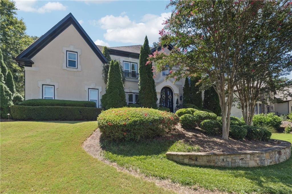 Discover the perfect balance of luxury living and family comfort in this beautifully maintained home, ideally located in the highly desirable Johns Creek. With access to top-rated North Fulton schools, this property offers not only a wonderful place to call home but also an incredible lifestyle for the whole family.
Step inside to find an inviting and spacious floor plan filled with natural light, elegant finishes, and versatile living areas designed for both entertaining and everyday life. The stone fireplace extends up to the ceiling in the two story great room adding to the warm living spaces, and comfortable bedrooms creating the perfect retreat for families of all sizes. The terrace level is partially finished as a game room/entertainment space with a full bathroom, as well as more space studded for an in-law apt and plenty of storage area.
Outside, the in-ground gunite pool is perfect for summer gatherings, poolside entertaining, or simply relaxing in your own backyard paradise. The lush surroundings provide both privacy and beauty.
Highlights include: Prime Johns Creek location close to shopping, dining, and parks
-Excellent school district with top-rated North Fulton schools
-Spacious, light-filled interior with timeless style
-Quiet, established swim/tennis neighborhood
Whether you’re looking to host elegant gatherings or create lasting family memories, this home has it all. Experience the best of Johns Creek living—schedule your showing today and see why 3765 Redcoat Way is the one you’ve been waiting for!