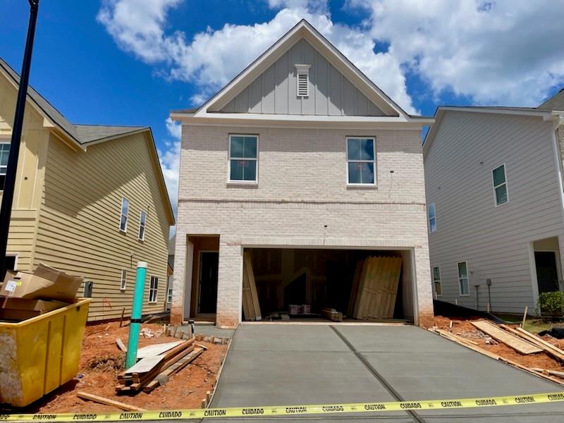 Traton Homes welcomes you to Winsome Park located in Woodstock Georgia. Our award winning Brooks J floorplan ready end of August 2025 and is optimized for entertaining, working from home and a lock and leave lifestyle. With a kitchen that WOWs, you will love the large center island with quartz tops, seating for 4 and plenty of prep space. There is also a walk-in pantry and gas cooking. Light from multiple windows floods your family room and dining areas and is a wonderful place to gather with friends and family. Upstairs is a flexible loft area perfect for a home office, play space or sitting area. The oversized Owner’s suite includes a sitting area, huge closet and nicely appointed bath with spacious shower, dual vanity and linen closet. Secondary bedrooms are very generously sized and share a full bath. The best part of this home will be the Covered Patio area! This home should be ready to move in August 2025. Home is under construction. PHOTOS WITH FURNITURE ARE STOCK PHOTOS AND ARE NOT OF ACTUAL HOME. See agent for information about a special rate buydown incentive for this home!