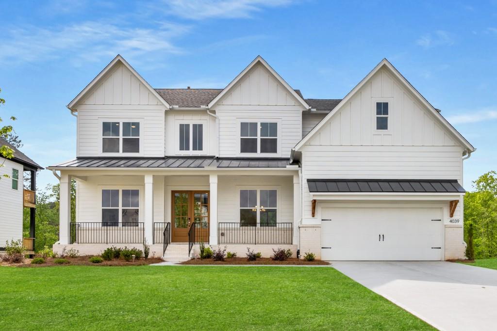 Experience Elevated Living in This Rare, Brand-New Toll Brothers Lakefront Masterpiece in the Coveted Holly Farms Community. Perfectly tucked on a Quiet Cul-De-Sac between Woodstock and Milton, this Modern White Farmhouse is one of only four Exclusive Lakeview Lots, blending High-End Design, Everyday Comfort, and Unmatched Outdoor Serenity. A Beautiful Wood Front Door and Covered Front Porch set the stage, inviting you into a Soaring Two-Story Foyer bathed in Natural Light. Wide-Plank Natural Hickory Hardwood Floors flow throughout the main level, offering warmth and elegance at every turn. To the right, a Formal Dining Room provides the perfect backdrop for special occasions, while the open-concept Living Area centers around a Floor-to-Ceiling Tiled Gas Fireplace. Expansive Sliding Glass Doors fully retract to reveal a Covered Outdoor Deck overlooking the Lake and a Lush, 15,000+ Square Foot Lot creating a seamless Indoor-Outdoor Experience with Exceptional Privacy. The Showstopping Chef's Kitchen is the Heart of the Home, complete with Top-of-the-Line Stainless Steel Appliances, Custom Cabinetry, a Handcrafted Tile Backsplash, Walk-In Pantry, and an Oversized Quartz Island built for gathering. A Bright, Window-Lined Breakfast Nook is ideal for casual meals, while a thoughtfully placed Dry Bar connects the Kitchen and Dining Room perfect for morning coffee or cocktail hour. A Flexible Main Level Bonus Room offers endless possibilities as a Home Office, Playroom, or Sitting Room. Nearby, a Private Guest Suite features a Generously Sized Bedroom and an Elegant En-Suite Bathroom with High-End Finishes. A Convenient Powder Room is tucked just off the main living area. Upstairs, the Owner's Retreat is a Private Sanctuary designed with both luxury and tranquility in mind. Enjoy Peaceful Lake Views from your bedroom, and unwind in the Spa-Inspired Bathroom with Wood and Gold Accents, Dual Vanities, a Large Soaking Tub with Herringbone Tile, and a High-Tech Rain Shower featuring Three Body Jets, Ceiling-Mounted Rainhead, Dual Wall Shower Heads all controlled by Smartphone or Digital Panel. A Massive Walk-In Closet completes this dreamy retreat. Four Additional Upstairs Bedrooms each offer En-Suite Baths with Designer Tile, Quartz Counters, and Premium Fixtures. The second level also includes a Spacious Laundry Room with Extra Storage and Eye-Catching Patterned Tile Flooring. Downstairs, the Full Daylight Walkout Basement with Eleven Full-Size Windows and Glass Doors is Partially Finished and Ready to Customize. Whether you envision a Home Theater, Gym, Playroom, Extra Bedrooms, or Office Space, the potential is endless. Already Fully Insulated and equipped with a Sump Pump, it's a solid foundation for future expansion while offering excellent Storage. This home is loaded with Modern Conveniences, including Energy-Efficient Systems, Separate Climate Controls on Each Floor, a Garage EV Charger, Smart Home Technology, Whole-House Gigabit WiFi, and Three Tankless Navien Water Heaters plumbed to work in tandem for maximum efficiency. Holly Farms offers more than just a place to live it's a lifestyle. Enjoy Scenic Lake Walks, a Resort-Style Pool and Cabana, Pickleball Courts, and a True Sense of Community. All just minutes from Downtown Alpharetta, Halcyon, Crabapple, Avalon, Canton Street, and Premier Golf Courses with access to Top-Rated Schools and endless Shopping, Dining, and Entertainment options. This is more than a home, it's your forever destination!
