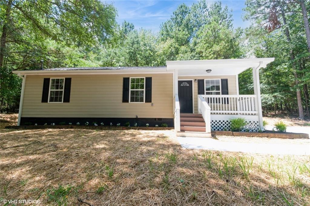 Renovations are complete! Ranch home on 2 acres down a long driveway. 3 bedrooms. 2 bathrooms. Kitchen features new granite counter tops, subway tile back splash, stainless kitchen sink, and stainless steel appliances. Primary bedroom features a Primary Bath and walk-in closet. Bedroom 2 and 3 feature large closets. New interior Agreeable Gray paint throughout. All new black lighting, black fixtures, and black hardware throughout. The roof shingles are new. New gutter system includes gutter guards. The new Heat Pump system with wifi thermostat keeps the house temperature even. New electric water heater. New water line from the meter to the house. New septic system. The house is hidden by an approximately 500 foot long driveway. This is a Fannie Mae property.