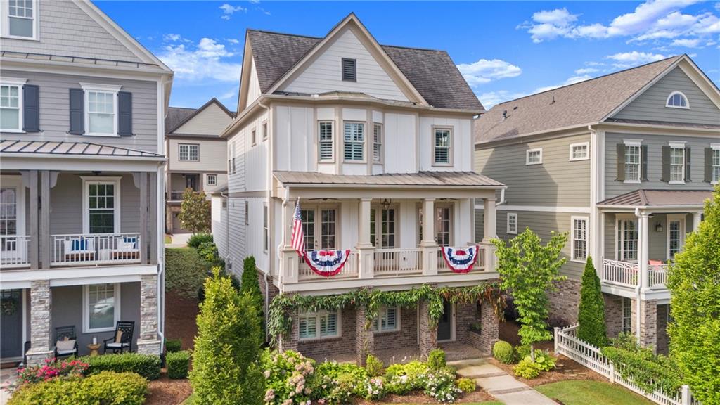 ***Limited Time Offer: Enjoy a First-Year Mortgage Rate of Just 3.99%!
Take advantage, don't miss this special offer with first year mortgage rate of 3.99, 2nd year 4.99 locked at 5.99 after** Do you want to live a lifestyle that has been thoughtfully designed to combine luxury with all the amenities and entertainment at your fingertips. This vibrant neighborhood feels like its own little town with with beautiful streets * sidewalks, walking trails, clubhouse, gym, pool, outdoor amphitheater, firepits (they even provide the firewood) walk to shops within the community or 1/2 mile walk (Golf Carts permitted) to downtown Woodstock restaurants, breweries and entertainment. Whether you’re looking to stay social with community clubs and planned events or simply soak in the energy of this lively setting, you’ll love the balance of activity and comfort. One of the few detached homes available, this rare property features a three-car garage with main-level entry—an uncommon find in this community. Inside, you’ll discover standout upgrades like a new high-capacity HVAC system (2022), whole-house surge protection, and built-in surround sound with custom lighting throughout. The gourmet kitchen impresses with ceiling-height cabinetry, a custom vent hood, walk-in pantry, and a dedicated coffee bar. There’s also a home office on the main level, perfect for today’s lifestyle. *Designed with impeccable detail and premium finishes, this is more than just a home—it’s your gateway to the best of Downtown Woodstock living