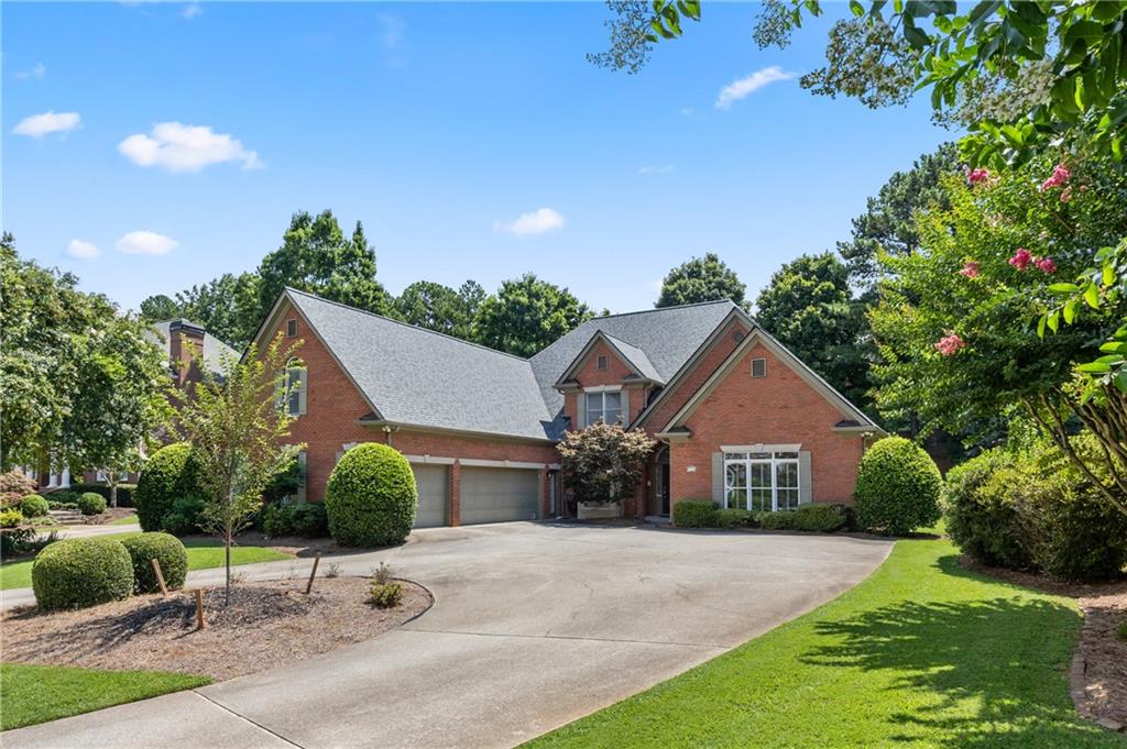 Incredible Opportunity in the Coveted Nesbit Lakes Community!
This stunning four-sides brick home offers a spacious and thoughtfully designed open floor plan. The inviting entry foyer is flanked by a formal dining room and formal living room, and flows seamlessly into the dramatic two-story grand room with fireplace—perfect for entertaining. The chef’s kitchen is a true standout, featuring stainless steel appliances, new cabinetry, stylish backsplash, and a sleek vent hood. Gleaming hardwood floors run throughout the main level. The expansive primary suite is conveniently located on the main floor and boasts an updated spa-like bathroom with granite-topped double vanities, an oversized double-headed shower, and custom his-and-hers closets. Two additional bedrooms on the main share a full bath, and there's also a half bath for guests. Upstairs offers even more space with a loft area, a private office, two additional bedrooms each with en-suite baths, a second half bath, and a large bonus room—ideal for media, playroom, or workout space. Additional highlights include a 2-year-old roof, 3 new HVAC systems, a 3-car side-entry garage, a Circular driveway, and a Fenced backyard with screened porch and brick paver patios. Abundant storage throughout! Enjoy resort-style living with fantastic community amenities including swim, splash park and kids pool, tennis courts , pickleball courts, clubhouse, playground, fire pit area and access to 2 large scenic lakes. Conveniently located within walking distance to top-rated private and public schools and easy access to GA 400, Historic Roswell, Downtown Alpharetta, and Avalon.