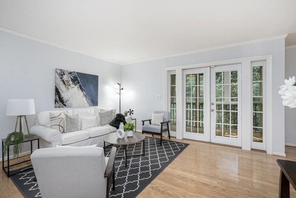 Prime Morningside Location in Carlyle Heights! Live in the heart of it all with this beautifully maintained Condo in Carlyle Heights, perfectly positioned just Steps from Piedmont Park, the BeltLine, Dining, Shopping, Playgrounds, Dog Parks, Grocery Stores, Gyms, and more. Hardwood Floors flow seamlessly from the Light-Filled Family Room, complete with French Doors to your Private Balcony, into the open Dining Room. The adjacent Kitchen features White Cabinets, Granite Counters, Stainless Steel Appliances, a Built-In Pantry, and a Breakfast Bar ideal for everyday living and entertaining. Enjoy Two Spacious Bedrooms, including a Primary Suite with a Private Bathroom. The Secondary Bedroom is served by a Hall Bathroom, providing comfort and flexibility for everyone. The community itself is a true retreat, featuring a Gated Pool, Private Green Space, Gazebo, Dog-Friendly Walking Trails, and plenty of Guest Parking. With a Quick Commute to Midtown, Downtown, Emory, Buckhead, and the CDC, this home offers the perfect blend of location, lifestyle, and ease.