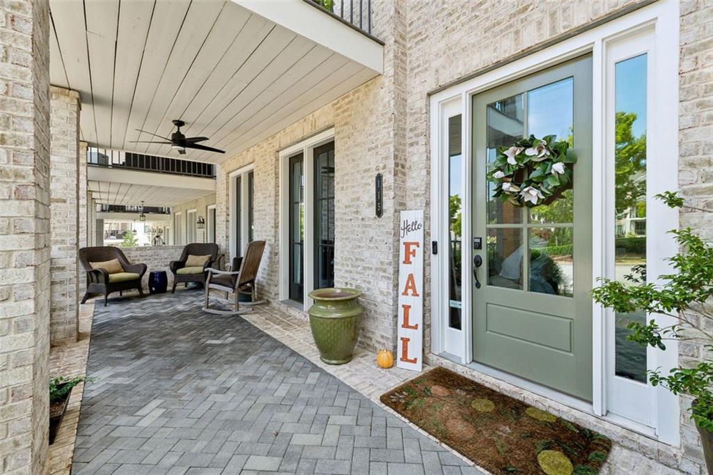 Experience sophisticated living in the heart of Roswell at 115 Harlow Circle, a premier residence in the coveted Harlow West community and the largest floor plan offered—price starting well below appraised value. This 3,000+ sq. ft. Charleston layout blends open-concept design with elevated finishes, featuring a chef’s dream kitchen with quartz countertops, oversized island, farmhouse sink, upgraded appliances, and designer backsplash; fireside family room, keeping room, and breakfast nook opening to a covered patio; spa-inspired primary suite with walk-in shower and custom closet; and a flexible lower-level guest suite or office. Enjoy outdoor charm with three inviting porches, plus thoughtful upgrades including surround sound, enhanced security, and an elevator-ready shaft for future installation. Harlow West offers resort-style amenities such as a clubhouse, two pools with cabanas, tennis and pickleball courts, dog park, green spaces, and walking trails—all just minutes to Avalon, Downtown Alpharetta, Downtown Roswell, GA-400, and within walking distance to the Ameris Bank Amphitheatre. Don’t miss this rare opportunity to own one of Roswell’s most desirable townhomes—luxury, convenience, and unbeatable value all in one.