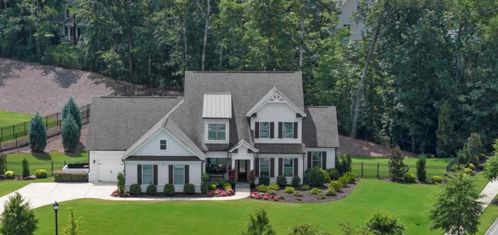 IF YOU EVER WANTED TO LIVE IN AN ELEGANT MODEL HOME W/BEAUTIFUL QUALITY CRAFTSMANSHIP-THIS IS YOUR CHANCE! SO MANY WONDERFUL UPGRADES IN THIS IMPECCABLY MAINTAINED HOME W/BEAUTIFULLY LANDSCAPED YARD/A PRIVATE MANICURED FENCED BACKYARD W/FABULOUS SCREENED PORCH INCL. EXTRA SHADED SCREEN TOO/THIS HOME HAS AN AMAZING FLOOR PLAN- NATURAL LIGHT IS ABUNDANT/ADDED PLUS IS ALL L.E.D.LIGHTING & ADDED RECESSED LIGHTING/SO MANY TRAY CEILING DETAILS/5 INCH PRE-ENGINEERED OAK FLOORING THROUGHOUT/SO EASY TO ENTERTAIN W/ELEGANT DINING RM W/PANELED WAINSCOT DETAILS/LOTS OF FAMILY AND FRIENDS ENJOYMENT CAN BE IN THE LARGE OPEN FIRESIDE GREAT ROOM OPENING TO THE FABULOUS EXTENDED SIZE KITCHEN W/ADDED CABINETRY-DOUBLE OVENS/5 BURNER GAS COOKTOP W/STAINLESS STEEL HOODED VENT/BUILT IN MICROWAVE/FRENCH DOORS REFRIGERATOR/SOPHISTICATED GRANITE COUNTER TOPS/LARGE SINK IN THE OVER SIZED GRANITE ISLAND W/SEATING AT BAR--THERE IS ENOUGH ROOM FOR CASUAL DINING ADJACENT TO ISLAND BUT IF YOU WANT ANOTHER SITTING AREA INSTEAD- THE STACKED STONE FIRESIDE KEEPING RM IS A GREAT ADDITION! SCREEN PORCH IS ADJACENT FOR YOUR MORNING COFFEE ENJOYMENT/LARGE WALK IN PANTRY/BEADBOARD DETAILED CABINETS IN MUDROOM/GUEST BEDROOM SUITE WITH FULL BATH IS CONVENIENTLY LOCATED ADJACENT TO KITCHEN AREA/LARGE OWNER'S SUITE W/TRAY CEILING/RECESSED LIGHTING/SITTING AREA/ELEGANT SPA BATH W/OVER SIZED SHOWER/SOAKING TUB/LARGE SEPARATE VANITIES/CUSTOM BUILT HUGE HIS AND HERS CLOSET/WONDERFULLY SIZED STUDY ON MAIN FLOOR W/CLOSET/THE LAUNDRY RM/SINK W/ STORAGE CLOSET IS ADJACENT TO OWNER'S SUITE WHICH IS SO CONVENIENT/POWDER ROOM BY GREAT RM/IMPRESSIVE WROUGHT IRON RAILING ALL WOOD OVER SIZED TREAD OPEN STAIRCASE LEADS YOU TO A WONDERFUL RETREAT OR ENTERTAINMENT AREA & 3 BEDROOMS TOO! THERE IS PLENTY OF STORAGE IN THIS HOME AS WELL AS IN THE EPOXY SEALED FLOOR 3 CAR EXTENDED SIZE GARAGE/LARGE PARKING PAD ADJACENT/WONDERFUL CUL-DE-SAC STREET W/LARGER SIZED LOTS/GOVERNORS TOWNE CLUB IS THE ONLY 24/7 MANNED GATED COUNTRY CLUB COMMUNITY IN ALL COBB/PAULDING COUNTIES/THE LIKE NEW HUGE CLUBHOUSE HAS WONDERFUL DINING AND SPORTS BAR FACILITIES/LARGE EVENT AREAS FOR WEDDINGS OR PARTIES/GREAT SOCIAL EVENTS INCLUDING A WINE CLUB/GOLF LOCKER ROOMS/AN 18 HOLE CURTIS STRANGE DESIGNED CHAMPIONSHIP GOLF COURSE W/MOUNTAIN VISTA VIEWS/FOUNTAINS & PRIVATE LAKES/8 LIGHTED TENNIS COURTS & PICKLE BALL COURTS/TENNIS PAVILION FOR VIEWING/SECOND PRIVATE CLUBHOUSE FACING THE OLYMPIC SIZE POOL W/RECENTLY COMPLETED TIKI BAR FOR FUN WHILE SWIMMING/CHILDREN'S POOL & WATER SLIDES/CHILDREN'S PLAYGROUND AREA/BASKETBALL COURTS/SOFTBALL FIELD/WONDERFUL EUROPEAN SPA FACILITY & OVER SIZED EXERCISE FACILITY/WALKING TRAILS & SIDEWALKS/SO MUCH FUN TO ENJOY HERE IT IS LIKE BEING ON VACATION WHILE NEVER LEAVING HOME! CLOSE TO SHOPPING/RESTAURANTS/HIGHWAYS/LAKE ALLATOONA IS ONLY 15 MINUTES AWAY FOR BOATING/COBB COUNTY MCCULLUM AIRPORT IS ONLY 25 MINUTES AWAY TOO! THERE IS A MANDATORY $30,000 ATHLETIC MEMBERSHIP INITIATION FEE DUE AT CLOSING FOR THE COUNTRY CLUB MEMBERSHIP.
