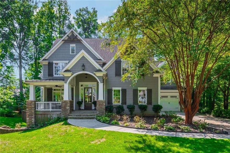 Complete redesign and custom build in 2016 by Ken McGarry Homes. Privacy awaits at this gorgeous wooded lot with unbeatable walkability—right in the heart of Downtown Alpharetta. This property is spacious on nearly a half-acre with a long, level driveway and perfectly set-back home to provide a large front yard. The backyard is truly captivating, featuring a 25-foot setback and preserved tree canopy with gorgeous oaks and hickories. The vaulted front porch sets the tone, welcoming you inside to a spacious home office with gas fireplace and serene views of the lush front yard and inviting porch. The thoughtfully designed kitchen is a true centerpiece, featuring a large seated island paired with contrasting honed granite counters, a gorgeous tile backsplash, and a gas range with griddle beneath a covered vent hood. A pot filler and farmhouse sink framed by windows overlooking the outdoors add both beauty and function. The dining area flows seamlessly into the family room, where a coffered ceiling, stone fireplace with hearth, custom built-ins, and expansive front-to-back windows create a light-filled space perfect for gathering. The main-level guest suite offers the ideal arrangement for generational living, blending comfort and convenience for extended family or visitors. A charming “friendship door” opens to a slate-accented hallway and mudroom, leading effortlessly to the casual porch room and the spacious three-car garage. To complete the main level and seamless flow, enjoy the expansive screened-in porch room designed with double fans, ample space for dining, lounge seating, and movie nights or football season —perfect for year-round gatherings. Upstairs, you’ll be greeted by a large, light-filled bonus room—an incredibly flexible space that can serve as a secondary living room. The primary suite impresses with a beautiful coffered ceiling and a spa-like bath featuring a frameless glass shower, free standing tub with polished feet, and a spacious walk-in closet. Three additional secondary bedrooms complete the upper level, each designed as a custom suite with direct bath access for comfort and privacy. From the moment you step inside, you’ll feel the custom touches that define this home—spanning over 4,000 square feet across two thoughtfully designed levels. The unfinished basement provides a blank canvas awaiting your personal design and future expansion.