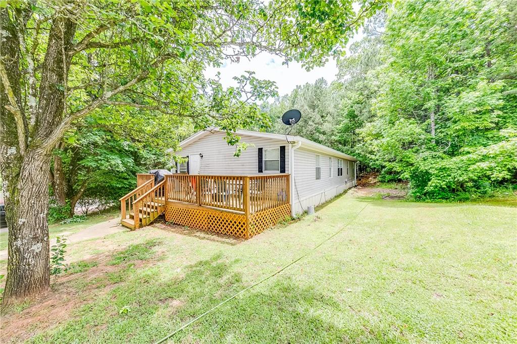 5 bed, 2 bath Double Wide in great location! Nice Community with pool, Gym, playground and meetings room. Minutes away from Mall of Georgia!
Lot Lease is $659 a month **Must complete a Background Check with Community with offer. The home could be moved with 90 day notice to the community. Renting is allowed as long as all involved pass background check. **Land cannot be purchased.
