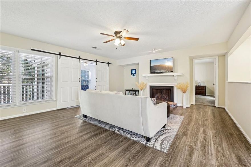 Discover this lovely 2 bedroom, 2 bathroom top-floor condo ideally located just steps from Marietta's Laurel Park. Designed for both comfort and style, the bright and open living space features large windows providing a generous amount of natural light and a cozy fireplace for those relaxed evenings. This roommate-style floor plan features a spacious dining area, sleek kitchen with ample storage and an enclosed den awaiting your personal touch and vision. The primary bedroom offers the ultimate retreat with a private en suite bathroom. The covered balcony is the perfect space for your morning coffee or unwinding after work. Don't miss out on this perfect blend of convenience, comfort and a low-maintenance lifestyle in the heart of Marietta.