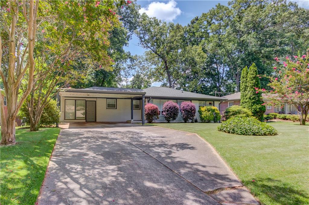 Welcome to this beautifully renovated Intown gem, thoughtfully designed for modern living. Enjoy a bright, open-concept layout with a sleek, functional kitchen ideal for entertaining. The main level features 3 bedrooms, 2 baths, plus a flexible bonus room and sunroom that can be used as a dining room, office, workout room, additional living space, or even a bedroom. Downstairs you will find a full finished basement that offers a spacious living area, additional bedroom, and a full bath, perfect for guests, a rental, or a private retreat. Enjoy a beautiful, fenced-in backyard ideal for relaxing, entertaining, or letting pets play safely. A new roof and gutters with gutter guards were added in 2021 with a 30-year warranty. All appliances, including the washer and dryer, stay with the property. Just minutes from I-20, East Atlanta Village, and Downtown Decatur. Don’t miss your chance to call this move-in-ready home yours!