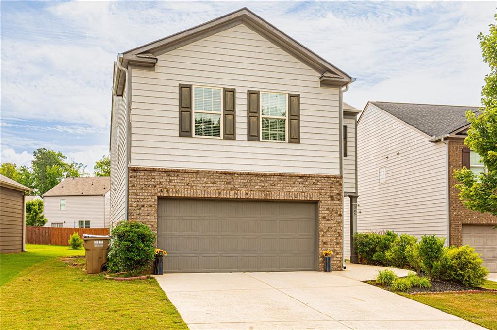This 4 bedroom, 2.5 bath home is located on a cul-de-sac in the Blacks Mill Preserve community, and is convenient to everything Dawsonville has to offer. The spacious layout has an open floor plan with granite counters in the kitchen, island with seating, stainless appliances, and a fireplace for your to enjoy. The home has a large primary bedroom with a great walk-in closet and primary bath with 2 sinks and separate tub & shower. The secondary bedrooms are spacious and the hall bath also offers 2 sinks, Laundry is located close by making this convenient to the bedrooms. A backyard to play in, plus a community playground and swimming pool, make this a great home for a growing family. Schedule your appointment today.