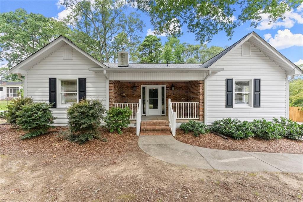 Charming Historic Ranch in the Heart of Winder! This beautifully maintained 3-bedroom, 2-bath home offers a perfect blend of historic charm and modern updates, all within the city limits of Winder. This home features an inviting open-concept layout, highlighted by true hardwood floors and an abundance of natural sunlight throughout. The updated kitchen includes granite countertops and stainless steel appliances, flowing seamlessly into the main living space. The spacious master suite features an updated en-suite bath, while two additional bedrooms offer flexibility for guests, kids, or a home office. Enjoy the outdoors in the large, fenced-in backyard complete with an outbuilding—ideal for storage, hobbies, or extra workspace. Just a short walk to the new Winder Legacy Park, local shopping, and dining options—this prime location offers convenience and lifestyle all in one! Don’t miss this opportunity. Schedule your private showing today!