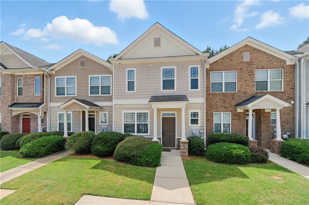 Welcome to this charming, move-in-ready townhome in the heart of Rex. Step inside to a welcoming foyer that leads to a separate dining room—perfect for family gatherings or entertaining—along with a convenient half bath and extra storage. The kitchen is designed for both function and connection, featuring a pass-through to the living room so you can enjoy cooking while staying part of the conversation. The living room feels open and inviting, with direct access to a private wooded backyard—ideal for morning coffee, weekend BBQs, or simply unwinding outdoors.
This home has been thoughtfully refreshed with new flooring, fresh paint, and updated kitchen and baths, creating a stylish and comfortable space that’s truly move-in ready. Upstairs, you’ll find three spacious bedrooms and two full baths, including a primary suite with a double vanity for added comfort. A soothing neutral paint palette flows throughout the home, creating a calm and modern feel.
With a low-cost HOA, you’ll enjoy the perks of homeownership without the heavy upkeep. Conveniently located just 15 minutes from the airport with easy access to major highways, plus shopping and dining nearby, this home blends comfort, style, and convenience in one perfect package.
