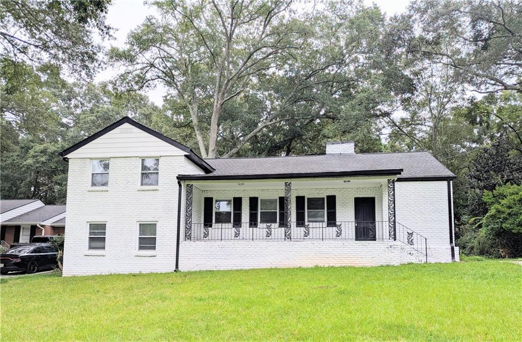 Located in one of the best-established neighborhoods in the Village of Stone Mountain, this all-brick split-level home offers charm, character, and a prime location—just a short distance to Stone Mountain Park. Featuring original hardwood floors throughout the main and upper levels, upgraded thermal windows, an updated kitchen with white cabinets and quartz countertops, and a renovated bathroom, this home blends classic features with modern touches. The partially finished basement provides additional flexible space. Cozy, private, and full of potential with just a little TLC, this property is perfect for homeowners or investors seeking a great opportunity in a highly desirable area. Schedule your showing today!
