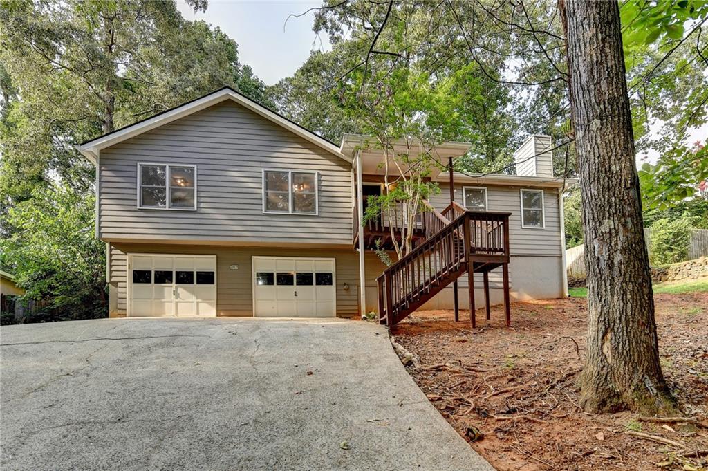 Welcome to your charming new home in the heart of Woodstock! This delightful 3 bedroom, 2-bathroom residence offer 1,456 square feet of thoughtfully designed living space, perfect for modern comfort and daily convenience. Discover the freshly painted interior and open floor plan that flows from the kitchen to the dining and living areas. The kitchen stands out with stainless steel appliances, granite counter tops and a view of the large fenced backyard-idea for weekend barbecues and badminton games. The spacious primary bedroom provides peaceful retreat with full en-suite bathroom and plenty of natural light.
Just minutes from downtown Woodstock, you'll love being close to great restaurants, shopping, and local events. The roof was replaced in January of 2025, as well as the garbage disposal and microwave. Furnace new in 2018, A/C 2014. All lights and fixtures just replaced. This home also features gutter guards and ring door bell. Come see just how much this home fits your needs.