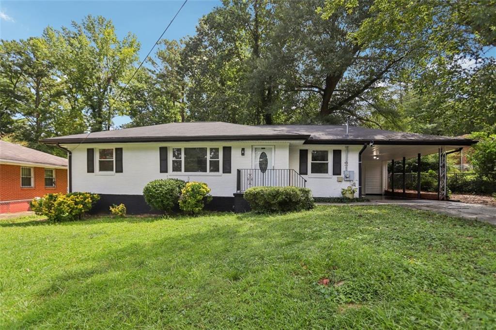 Fully renovated and move-in ready, this 3-bedroom, 2-bath home offers elevated living with thoughtful design throughout. The brand-new primary suite bathroom addition features a spa-inspired bathroom with a soaking tub, dual vanities, and a separate tiled shower. The kitchen is finished with granite countertops and premium fixtures, blending style and function seamlessly. Original hardwood floors run throughout, adding warmth and character. Enjoy a spacious backyard with a private patio— perfect for outdoor entertaining or quiet relaxation. With all-new HVAC, electrical, and plumbing systems, every major component has been upgraded for modern comfort. A fresh take on a classic home, designed for today’s lifestyle.