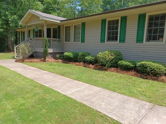 Nice Ranch Home On 2 Acres*Very Private*Has Gate Available To Lock If Desired Near Beginning Of Paved Driveway*3 Bedrooms/2 Baths*Vinyl Siding For Easy Exterior Maintenance*Back Porch With Large Fenced Backyard*Electric Fence*Large Poured Patio Area*Firepit Area* Additional Storage Building*This Home Has Been Well Taken Care Of*Plenty Of Room For Parking Additional Vehicles/Motorhomes, etc.*Located In Desired School District*Close To Carrollton/For An Easy Commute To West Georgia College*Easy Access To I-20*If Listing Broker Shows Property To Your Buyer, Buyer's Broker Commission Will Be 1%*