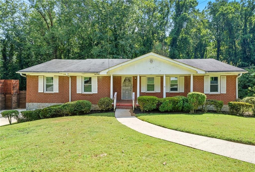 Fantastic Investment Opportunity in Atlanta! Spacious 4-bedroom, 2-bath home located inside the perimeter with easy access to I-285 and I-85. The main level features 3 bedrooms and 2 full baths, plus a flex space in the basement that can serve as a 4th bedroom or office. Enjoy plenty of living space, a private backyard, back deck, basement, and a 2-car garage, perfect for investors or homeowners looking to add value.