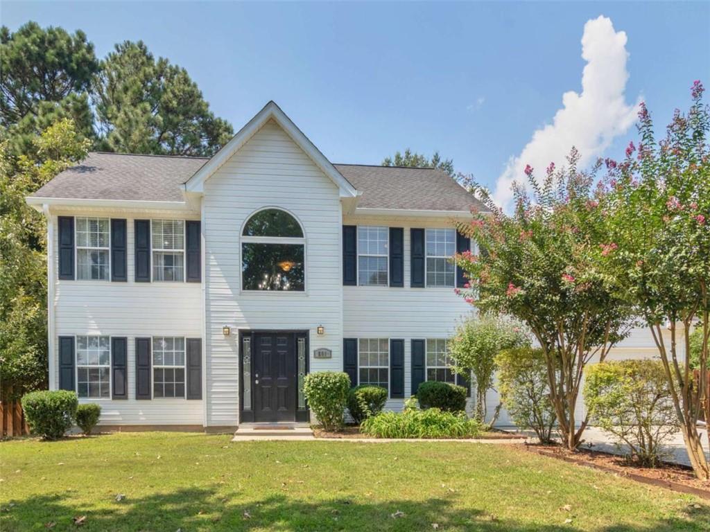 Nestled on nearly an acre in a quiet Henry County cul-de-sac, this stunning 4-bedroom home offers the perfect mix of charm, comfort, and modern updates. Step inside to an extremely spacious floorplan featuring a formal living room, formal dining room, and a cozy sunken family room with fireplace-ideal for both entertaining and everyday living. The renovated gourmet kitchen is a chef's delight, boasting sleek stainless steel appliances, granite countertops, and custom cabinetry. A convenient half bath is located on the main level, perfect for guests. Upstairs, all four bedrooms feature vaulted ceilings, ceiling fans, and generous closets. The charming master suite showcases a brand new tiled shower, relaxing soaker tub, and newer vanity. Outside, enjoy a full privacy fence, expansive concrete patio, storage building and a spacious backyard-a true dream for pet lovers. All this, just minutes from I-75, shopping, and dining for ultimate convenience. HVAC is 3 years old, Water Heater is 5 years old, and Roof was replaced within the last 5 years. Sell with Sasha!