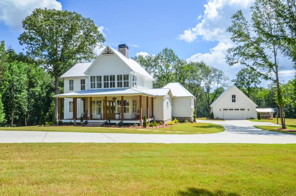 Welcome to paradise! This stunning 10 Acre estate has it all, 3 bedroom and 2 1/2 baths in the main house. The Detached includes additional living area/man cave. It has 1 bedroom, 1 bath and a kitchen. This beautiful home has tons of windows with natural light, open concept, 10 foot ceiling height downstairs with oversized 8' tall doors. The oversized Chefs kitchen features premium finishes, a large 8' x 5' island, a Kutch gas stove and oven, custom maple vent hood, Quartz countertops and a pot filler. Kitchen also has a farm house sink, lots of cabinets with a separate Butlers pantry with wine/beverage cooler. Primary suite on main, custom primary closet, primary bath includes double sinks, separate freestanding tub, and tiled shower with a rain head. This home also includes a mud room, LVP flooring through entire home, and covered front and back porches. Breathtaking custom full height, all brick, double sided wood burning fireplace! Upstairs features two large bedrooms with jack and Jill bath. Double sinks with quartz countertops and a separate shower and toilet room. Both upstairs rooms have large walk in closets. Spacious tiled laundry room with cabinetry for storage. Large Salt water, Gunite, 8' deep pool. Pool features spillover, heated spa with 6' tanning ledge. Outdoor speaker system around pool for all your pool parties. Irrigation surrounding pool and main house. 1/2 acre pond and 600' of creek access on rear of property. ATV trails cut on back of property. Pond has power access. This home has it all...
If that's not enough, this property also features a custom matching chicken coop with rear overhang storage for tractors etc. Room for gardening, horses or cows. 300' long double car driveway with 2 turnarounds. Custom brick and wood entrance with lighting. Entire house and detached has insulated spray foam insulation for high energy efficiency. Home is on Crawl space, that is entirely heated/cooled and encapsulated. Landscape lighting on front of home. Property is currently in land conservation for property tax savings. Located minutes to downtown Jefferson and a 20 minute drive to Athens.
