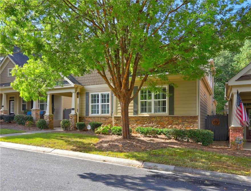 Discover one of the largest homes in The Glens at Mountain Brook, offering 2,100 sq. ft. of thoughtfully designed living space. The main level welcomes you with garage access leading directly into the spacious kitchen, complete with abundant cabinetry, a built-in breakfast nook, and seamless flow into the dining room—perfect for entertaining. The oversized primary suite is conveniently located on the main level, featuring elegant trey ceilings, a luxurious bathroom with dual vanities, and a generous walk-in shower. The inviting living room boasts soaring built-in bookshelves framing a beautiful gas fireplace, creating a warm centerpiece for gatherings. An additional main-level bedroom and full bath provide private space for guests, while a versatile flex room is ideal for a den or home office. Upstairs, you’ll find another bedroom and full bath, a cozy sitting area, and walkable attic storage. With its spacious layout and prime location, this home is an exceptional find for anyone seeking comfort, functionality, and style.