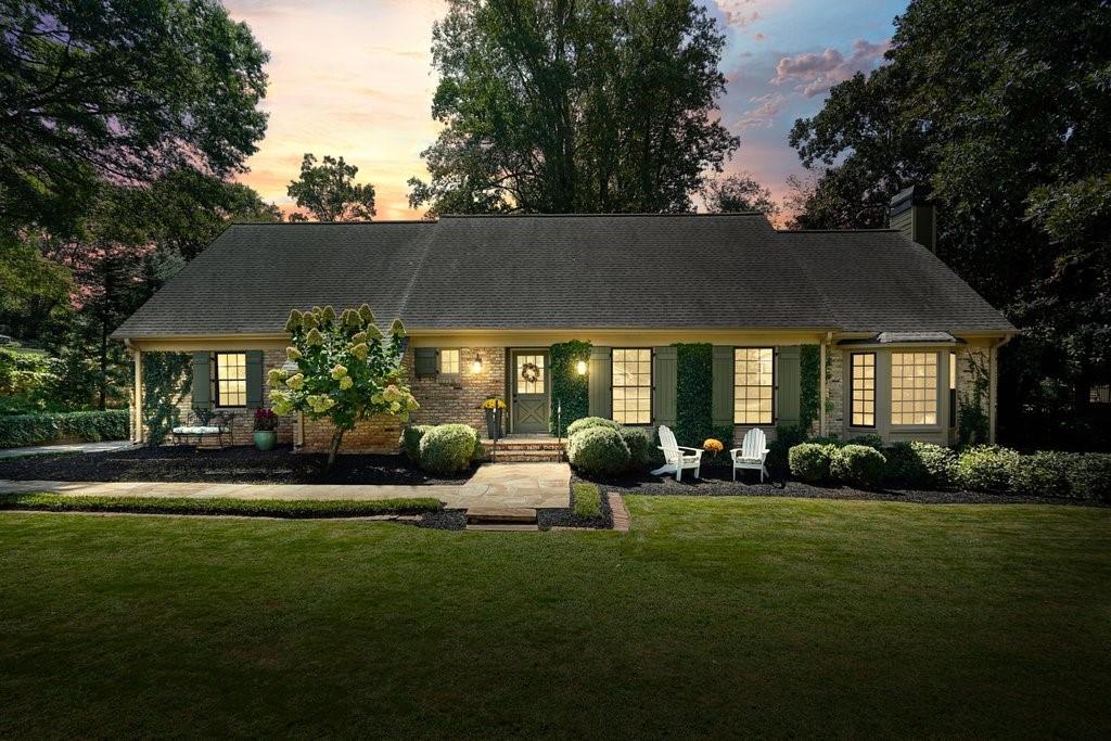 Timeless Cape Cod Charmer in Historic Marietta
Welcome to 662 Bouldercrest Drive SW, a completely renovated 4-bedroom, 2.5-bath Cape Cod-style beauty in the highly desirable Whitlock Heights community. Just moments from the vibrant Marietta Square, Tumlin Park, and the coveted Marietta Center for Advanced Academics, this home offers the perfect blend of historic charm and modern updates.
From the outside, the brick exterior, fresh paint, new landscaping, and fenced backyard set the stage. A two-car carport with a newly enclosed shed provides ample parking and storage. Inside, timeless character meets modern craftsmanship—crown molding, slate floors, 9-foot beamed ceilings, four fireplaces, and custom wood trim finishes around brand-new windows create a warm, inviting atmosphere.
The primary suite is conveniently located on the main level, providing the ease of one-floor living. The spa-like bathroom features luxurious finishes, while the walk-in closets offer abundant storage—all beautifully designed for comfort and style.
The heart of the home is the expansive kitchen and dining room combination. Completely remodeled, this breathtaking space is filled with natural light and finished in a modern cottage vibe that feels both elegant and welcoming. Perfect for gathering, cooking, and entertaining, it truly anchors the home.
This residence has been renovated from top to bottom, with every major system and surface replaced brand new—including:
Brand new windows throughout
Two new HVAC systems & brand new water heater
Fully updated electrical with new panel
All new plumbing on main, new toilets, and fixtures
Re-stained and repaired hardwoods on main level
Remodeled chef’s kitchen with new appliances
Renovated baths and new upstairs flex space
Waterproofed crawl space, stabilized foundation, new sod, fencing, and more
The stone fireplace in the family room adds warmth and character, while the new back deck and flagstone patio with an outdoor wood-burning chimney extend the living space outdoors—perfect for alfresco dining and cozy gatherings.
Upstairs you’ll find three spacious bedrooms, all sharing a renovated hall bath with a double vanity. Off the third bedroom sits a walk-in closet, additional storage room, and a versatile flex space that can be used as a craft room, office, playroom, or more. Abundant walk-in attic storage ensures everything has a place.
Originally built in 1964 on a .33-acre lot, this home perfectly balances history and modern convenience. With everything replaced brand new, this home is truly turnkey—ready for you to move right in.
Location, charm, and a full renovation—this one is absolutely breathtaking. Don’t miss your chance to call this Marietta treasure home!