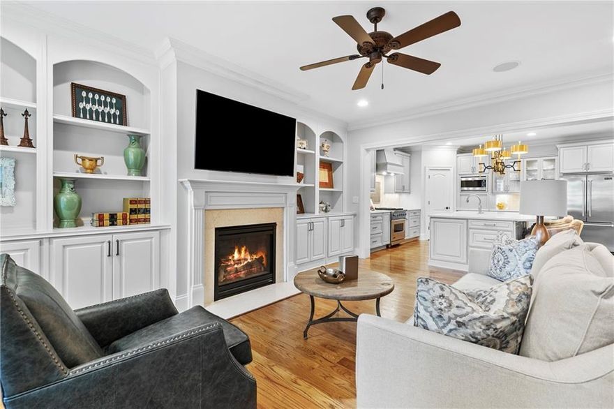 Welcome to the best of Roswell-Canton Street living at it's finest! Beautiful brownstone in the highly popular Providence neighborhood. Step inside the foyer and enjoy the updated kitchen with oversized island and gourmet chef's appliances. Gleaming hardwoods throughout the main level. Open living room and dining room, with the screened porch just off the living area. Imagine spending lazy mornings drinking coffee while enjoying the private, park-like natural space behind your home. Use the elevator to reach the 3rd floor with oversized master bedroom, sitting room perfect for home office or reading room, and updated ensuite bath with large shower and separate his and her vanities. Don't forget the generous his and her walk in closets. Secondary bedrooms also have plenty of closet space, along with a shared bath. Descend to the terrace level and enjoy a space perfect for guests, teen suite, or just entertaining. Step outside to the covered terrace patio and enjoy private evenings grilling out and just relaxing. Don't forget to enjoy the outdoor fireplace park, the dog park, pocket parks, as well as all the shops and restaurants on Canton street. You're steps away from all the best parts of Roswell. True convenience in the heart of Historic Roswell.