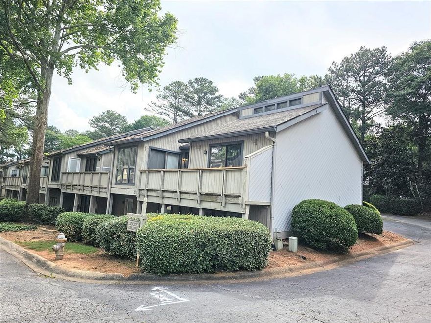 Fully renovated townhouse in a sought after location near the interstection of Lower roswell - Johnson Ferry road. This unique floor plan has vaulted ceilings on the main floor. Brand new kitchen with open access to the living area and to the outside deck. The formal dining area is next to the kitchen.There are two living rooms on this house, each floor has a living room with fireplace. Master bedroom is upstairs and it has a brand new bathroom that connects to the hallway. Downstairs area has a large living area and a bedroom with full bath with outside access. The powder room is on the lower level. The subdivision is going through a major renovation, which will see property values go up very soon. 
There is no seller's disclosure. This is a flip. Listing agent is a principal for the entity that owns the property and will sign on its behalf. Closing with Weissman Law firm.