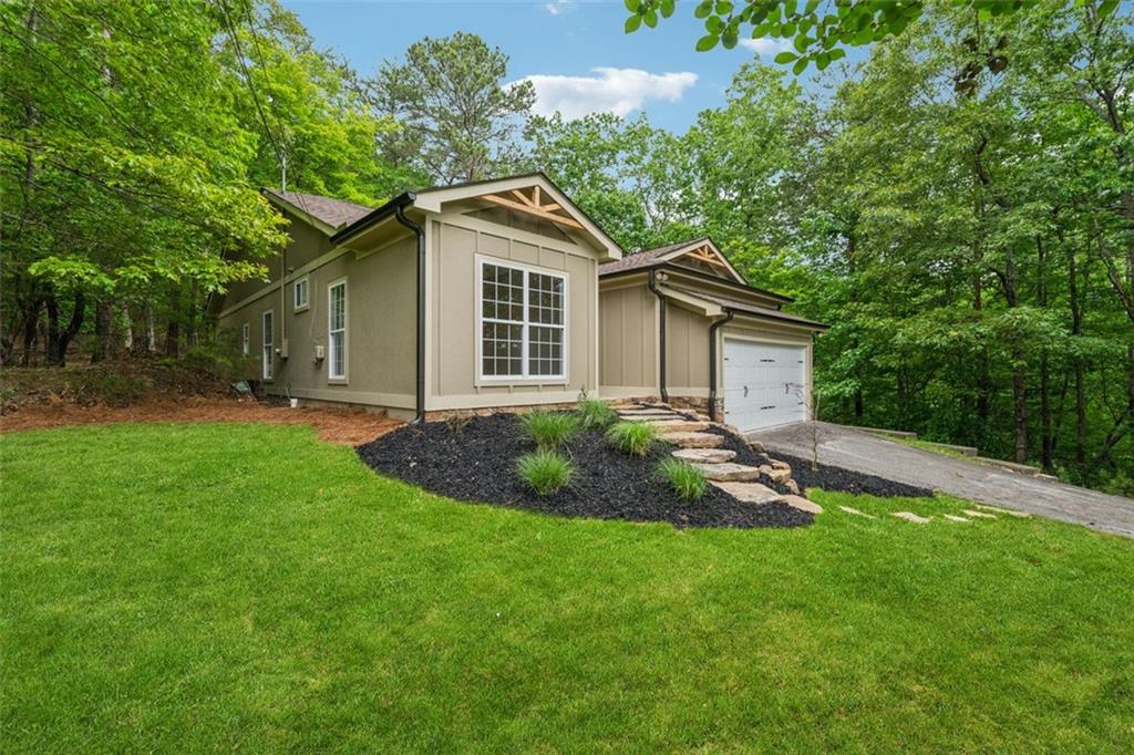 Welcome home to this craftsman ranch in the woods! Have you been looking for a new home on an established cul-de-sac lot? Look no
further! This essentially brand-new home features 3 bedrooms, 2 full bathrooms and nearly 1,800sf of living space. As you enter through
the welcoming front porch you can’t help but notice the amazing attention to detail. From the front door, you are greeted into the grand
open concept living space with vaulted ceilings! The large kitchen island is the focal point, with beautiful new white cabinets and a white
quartz countertops. This kitchen is a showstopper and will be a great space for entertaining! The ground level living space is perfect, and
very spacious. Each room has custom built-in closet shelving. The large, shaded back deck is the perfect spot to wind down and relax as
you watch the deer meander through the woods. This home has been completely renovated by the same builder that does most of the new
construction in Lake Arrowhead, so the build quality and reputation is something you can trust. Come check it out!
