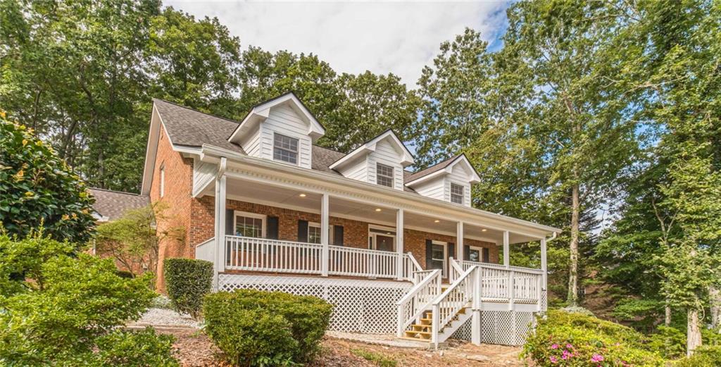 Welcome to 3031 Alta Ridge Way, a beautifully updated Cape Cod-style home offering timeless charm with modern touches. Step into the impressive two-story foyer, where to your left you'll find the formal dining room, and to your right, a main-level bedroom with a full bath conveniently located in the hallway. Continue straight ahead into the inviting family room, where a cozy fireplace serves as the focal point and creates the perfect gathering space. The family room flows seamlessly into the updated kitchen, featuring granite countertops, stainless steel appliances, abundant cabinetry, and a bright breakfast room overlooking the backyard. Just off the breakfast nook you'll find a convenient half bath and a dedicated laundry room, adding everyday functionality to the home's thoughtful layout. The owner's suite is located on the main level and offers a spacious en suite bath with a double vanity, walk-in closet, separate shower, and relaxing whirlpool tub enhanced with recent updates. Upstairs, you'll discover two generous bedrooms connected by a Jack-and-Jill bath, providing both space and functionality. The unfinished basement offers a blank canvas to create the additional living space you've always envisioned. Step outside onto the private back deck, perfect for morning coffee, grilling, or simply enjoying the wooded surroundings. With fresh interior paint, new flooring, updated fixtures, and modernized touches throughout, this home is move-in ready. Conveniently located near top-rated schools, shopping, dining, and with easy access to major highways, 3031 Alta Ridge Way combines classic style, comfort, and accessibility. Schedule a showing today.