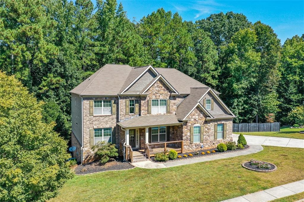 Tucked away in the heart of West Cobb’s sought-after Harrison High School District, this delightful home checks all the boxes. With 6 bedrooms, 4 bathrooms, a LEVEL, FENCED BACKYARD with space to add a pool on a quiet culdesac, this is more than just a house — it's the launchpad for your next chapter. Forget the long, winding drive or morning traffic jams just trying to exit your neighborhood. Hickory Plantation is a quaint enclave of just 34 homes, where TRADITIONAL CHARM MEETS ARCHITECTURAL PERSONALITY. Each home has its own flair — no cookie-cutters here (unless we’re talking about the ones you’ll be pulling out of your cabinets for baking)!
Whether you’re whipping up cookies for a bake sale or serving hors d'oeuvres for a baby shower this OPEN-CONCEPT KITCHEN is equal parts functional and stylish. With newly UPGRADED QUARTZ COUNTERTOPS and CUSTOM PAINTED CABINETS, there's room for all your culinary creativity to shine.
With a SPACIOUS EAT-IN AREA and a TWO-STORY GRAND ROOM guests can mingle, munch, and make memories.
It’s football season, and this gathering area is ready to bring the stadium vibes home! Picture a large sectional, an oversized coffee table loaded with game day snacks, & SURROUND SOUND SPEAKERS to make every touchdown feel like you're there in person.
Come holiday time, the SOARING TWO-STORY CEILINGS are practically begging for a grand Christmas tree. BUILT-IN BOOKSHELVES are perfect for rotating family photos and festive décor throughout the year.
A dedicated FLEX ROOM offers endless possibilities — from a home office to a playroom or reading nook. With wall-to-wall built-in bookshelves, it’s easy to keep everything tidy and organized.
And speaking of tidy NEWER LVP FLOORING flows seamlessly through the main level and all bedrooms, giving your home a clean, cohesive look.
Overnight guests will love the privacy of the MAIN-LEVEL BEDROOM and full bath. Upstairs, you’ll find four more spacious bedrooms, including a primary suite w/a CUSTOM CLOSET SYSTEM that keeps shoes, bags, and bling beautifully organized. (No wire racks in any closet anywhere in the house!)
Whether you're welcoming extended family, hosting long-term guests, or simply planning for the future, the FINISHED TERRACE LEVEL offers a private and versatile living space.
Thoughtfully designed with both comfort and function in mind, this lower-level retreat features a 6th bedroom, full bathroom, and a generously sized living area. There’s even an additional flex room that can easily serve as a home office, hobby room, fitness area, or private dining space.
It’s already PLUMBED FOR A KITCHENETTE w/the infrastructure in place to make it truly self-sufficient — ideal for multi-generational living.
Need storage? There’s unfinished space for seasonal décor, keepsakes, or anything else you need tucked away.
With over two acres of HOA-OWNED GREENSPACE directly behind the home and adjacent to an additional 13+ acres of Cobb County greenspace, your backyard views are filled with TRANQUILITY AND TREES, not rooftops.
Relax on the HUGE BACK DECK with a glass of sweet tea or your favorite cocktail and enjoy the seasonal show as the leaves change color or take a walk through the wooded trails keeping your eyes peeled for friendly wildlife!
If you’ve got energetic kids or pups, the spacious, FENCED BACKYARD is ready for all the games — from tag and cornhole to catch and flag football.
Hickory Plantation offers a perfect balance — a friendly, well-maintained community with a HOA that protects your investment (NO RENTALS ARE PERMITTED) with the option to join Brookstone Country Club for pools, tennis, golf, fitness & dining.
Just 1 mile to Publix, Kroger, and a variety of fast food and fast casual dining options, you’ll love how easy it is to grab groceries, takeout, or a morning coffee. Allatoona Creek Park & the Northwest YMCA (1.2 miles away!) offer fantastic ways to stay active year-round.
Ready to Fall in Love?
Schedule your showing today!