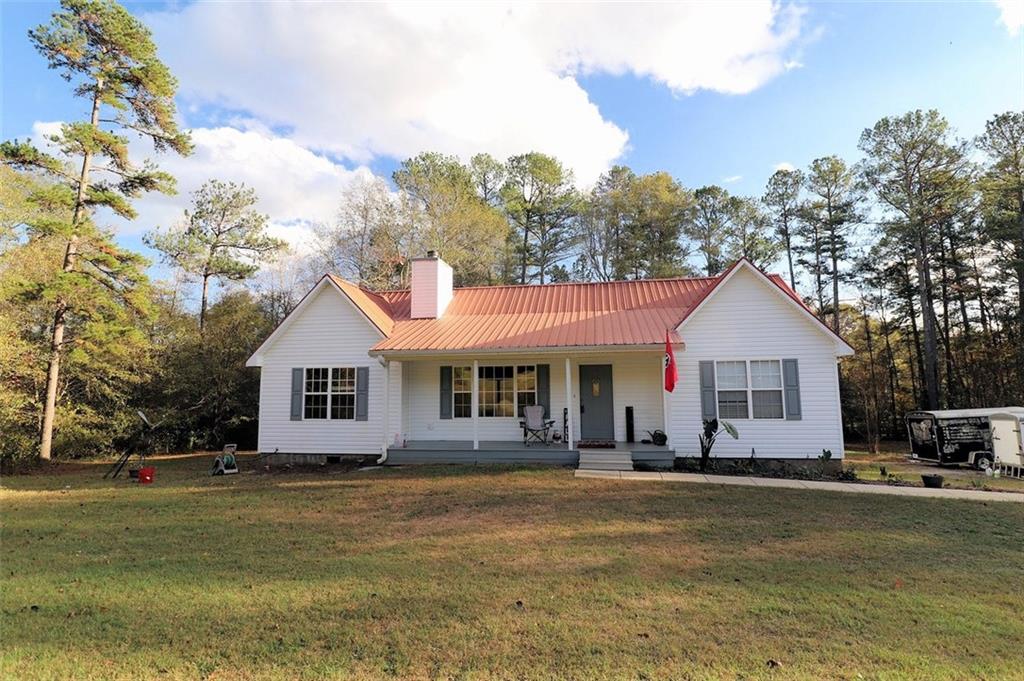 What an awesome property! 1.85 acres hidden from the road for wonderful privacy. Nice Ranch home on an unfinished basement. Large living room features a fireplace and vaulted ceiling. Eat-in Kitchen features stainless steel appliances. 4 bedrooms and 3 full bathrooms. There are 2 Primary Bedrooms with primary bathrooms. 2 more secondary bedrooms share a hall bath. Basement is partially finished including a half bath and HVAC. The huge barn has lots of potential!