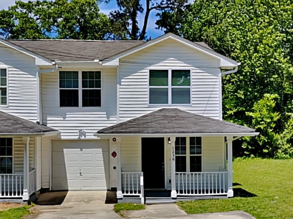 Beautiful townhome in Pinedale! Covered front porch! Spacious living room! Kitchen features white cabinets, stone counters, stainless steel appliances, pantry, and separate breakfast/dining area! Half bath on the main! Three spacious bedrooms upstairs with two full bathrooms! Rear deck for relaxing or entertaining! A must see! Don't miss out!