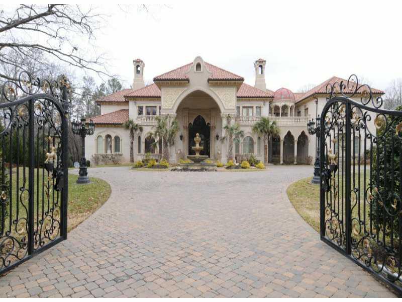 PALATIAL MOORISH INSPIRED MASTERPIECE. GRAND PRTE COCHERE, FOUNTAIN AND ELABORATE GATES WELCOME YOU INTO A TREMENDOUS ENTRY WITH SWEEPING STAIRCASE, MASSIVE CHANDELIERS AND SOARING CEILINGS. TOP OF THE LINE KITCHEN AND BATHS. RESORT STYLE POOL WITH SWIM UP BAR AND FOUNTAIN. FORMAL GARDENS AND A TWO LEVEL STUDY/LIBRARY. EXQUISITE MURALS AND AMENITIES TOO NUMEROUS TO MENTION. FOR THOSE SELECT FEW WHOSE HOME IS TRULY THEIR PALACE.