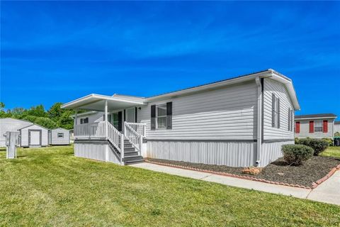 Photo of 916 Bel Air Boulevard Blvd, Hampton, GA 30228 (MLS # 7757404)